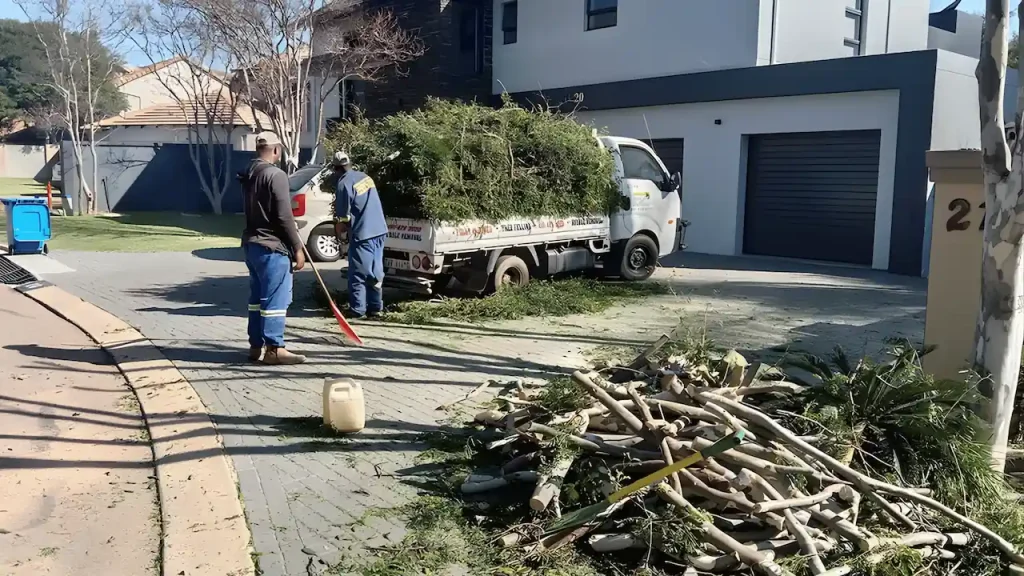 Pretoria East Tree Felling team clearing branches after a tree removal job
