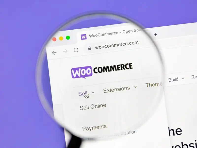 WooCommerce website menu viewed through a magnifying glass
